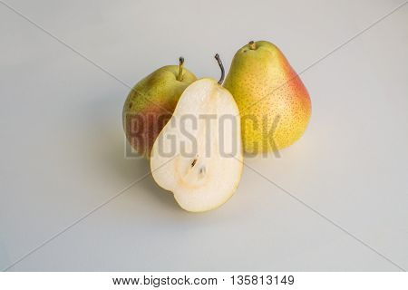 Ripe corella Australian pear fruits on a white background