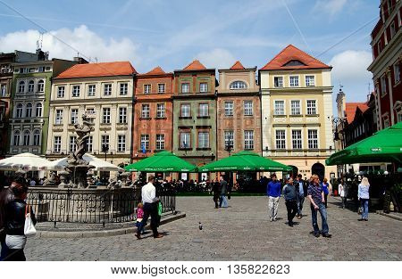 Poznan Poland - May 23 2010: Row of colourful baroque 17th century houses lines Rynek market square