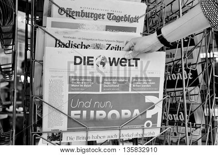 Woman Buying Die Welt Newspaper With Shocking Headline About Brexit