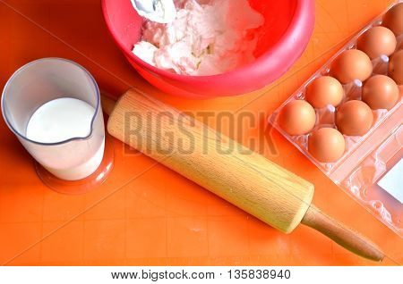 Ingredients which are needed to make a cake - farina milk and eggs