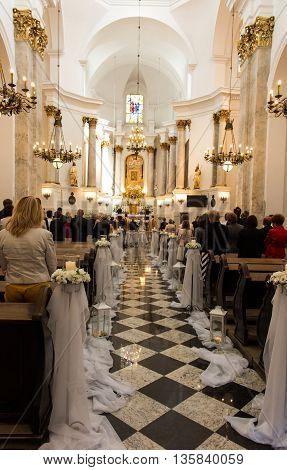 Chelm Poland - June 11 2016: Wedding in the historic Basilica of the Virgin Mary in Chelm in eastern Poland