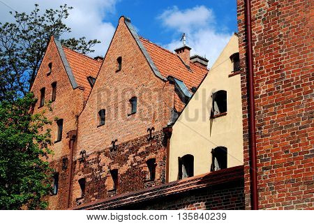 Torun Poland - May 26 2010: 15th century Hanseatic style houses seen from the old city defense walls