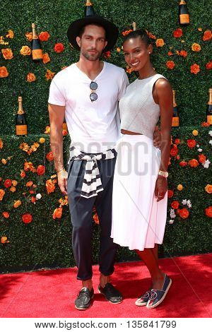 JERSEY CITY, NJ - MAY 30: Models Tobias Sorensen (L) and Jasmine Tookes attend the 8th Annual Veuve Clicquot Polo Classic at Liberty State Park on May 30, 2015 in Jersey  City, New Jersey. 