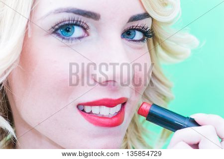 Lips with lipstick makeup for the face.