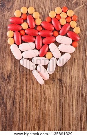 Heart Shaped Colorful Medical Pills And Capsules, Health Care Concept, Copy Space For Text