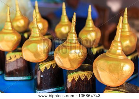 Kyaikhtiyo model souvenir from Myanmar. Golden Rock souvenirs for sale. Kyaiktiyo Myanmar. Tourist souvenirs of the Golden Kyaikhtiyo Rock shrine.