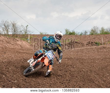 WorcesterUK-April 24 2016 :A competitor taking part in a Motocross race.Motocross is an extreme sport with venues in many countries around the world. This was a free event with no photography restrictions.