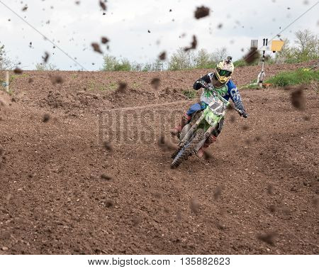 WorcesterUK-April 24 2016 :A competitor taking part in a Motocross race.Motocross is an extreme sport with venues in many countries around the world. This was a free event with no photography restrictions.