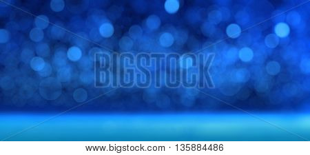 blue abstract background. Many bokeh circles of varying intensity