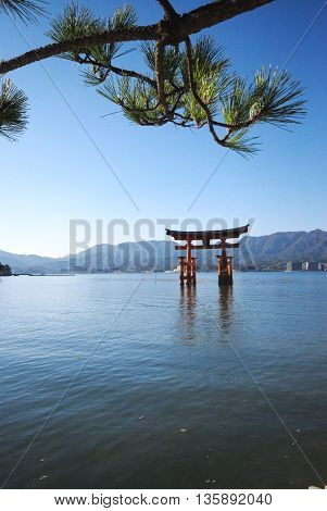 The great torii, red shrine in the sea. A famous landmark in Miyajima island, Japan.