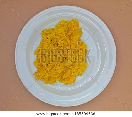 Saffron risotto made with Carnaroli rice medium grained rice grown