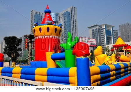 Chengdu China - October 7. 2013: Magical kingdom inflated children's play area at the Long Tan Water Village