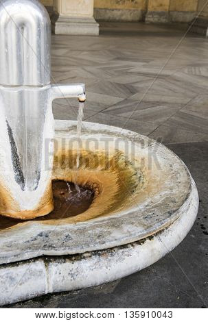 Hot mineral spring in Mill colonnade (Mlynska kolonada) in Karlovy Vary spa, Czech Republic