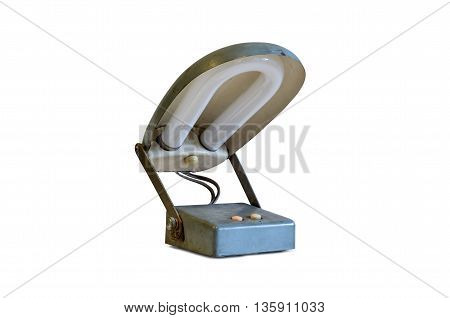Old metal table-lamp isolated on white background.