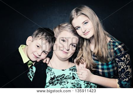 Real Family. Portrait of Mother Son and Daughter