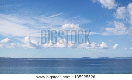 Light Blue Dalmatian Seascape with Cloudy Sky in Croatia