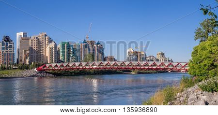 CALGARY, CANADA - JUNE 5: The Peace Bridge spanning the Bow River on June 5, 2016 in Calgary, Alberta. The Peace Bridge was designed by celebrity architect Santiago Calatrava.