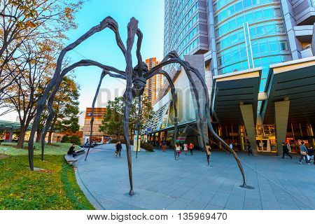 TOKYO JAPAN - NOVEMBER 28 2015: Maman - a spider sculpture by Louise Bourgeois situated at the base of Mori tower building in Roppongi Hills