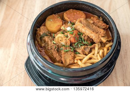 Gamjatang Korean Spicy Pork rib Soup with Kimchi and udon