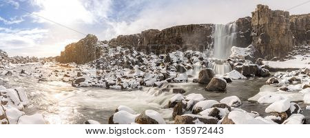 Oxararfoss Waterfall in the winter in pingvellir valley National Park in Iceland panorama