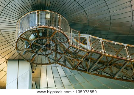TOKYO JAPAN - NOVEMBER 27 2015: Fuji T.V. headquarters one of the most striking buildings in Japan. its' futuristic metallic clad building featuring a massive silver ball 32 metres in diameter