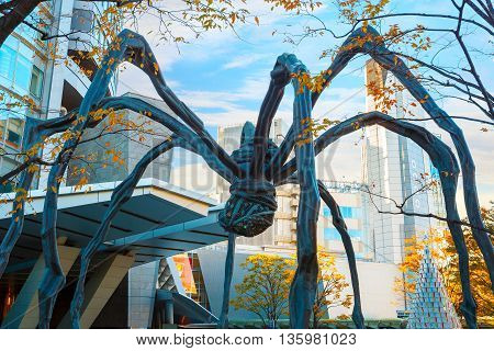 Tokyo, Japan - November 28 2015: Maman - A Spider Sculpture By Louise Bourgeois, Situated At The Bas