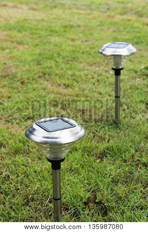 Solar Light in the grass. Clean energy is popular. For Earth, Superfund