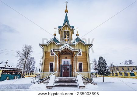 The Wooden Church Of St. Nicholas At Winter Day Time. Church Was Founded At The Beginning Of The 20t
