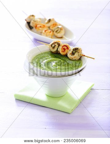 Green Fresh Vegetable Cream Soup With Skewers.