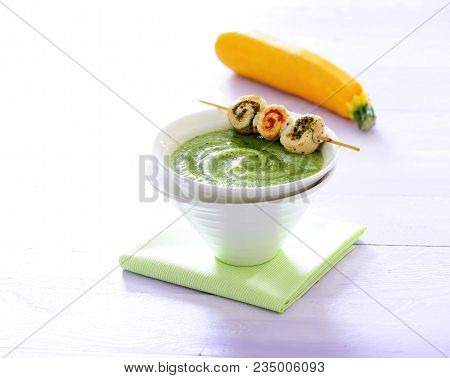 Green Fresh Vegetable Cream Soup With Skewers.