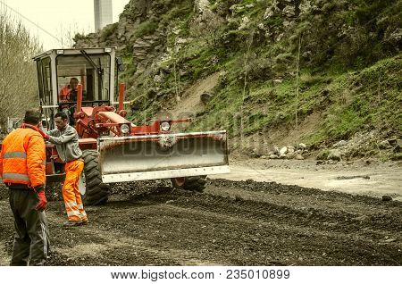 Ashtarak,armenia,19 Februar,2018:construction Workers On The Tractor Paving A New Bypass Road In The