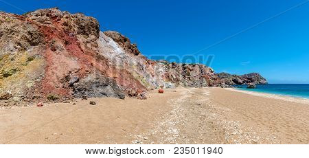 Panoramic View Of Multicolored Rocks On Paleochori Beach Located On The South Coast Of Milos. Cyclad