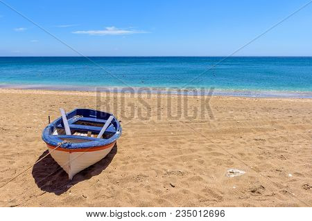 Rescue Boat On Beautiful Sandy Paleochori Beach On Milos Island. Cyclades, Greece.