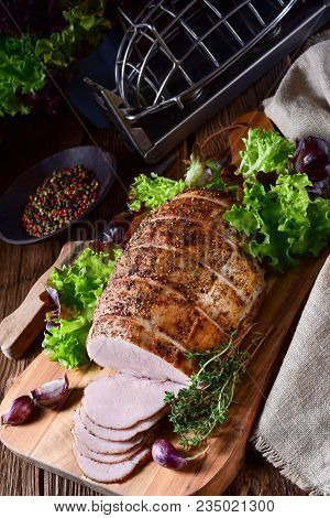 A Tasty Cooked Ham With Colorful Pfefer