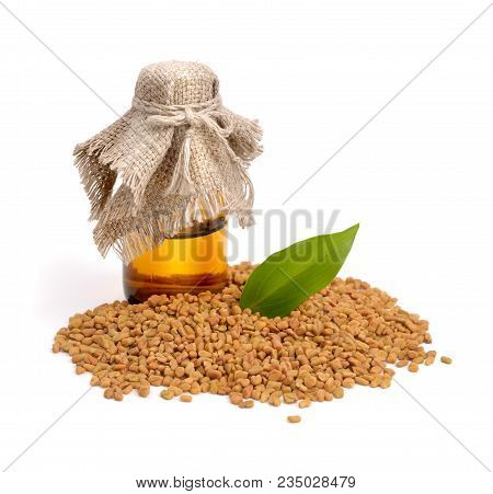 Fenugreek Seed With Pharmaceutical Bottle. (trigonella Foenum-graecum)