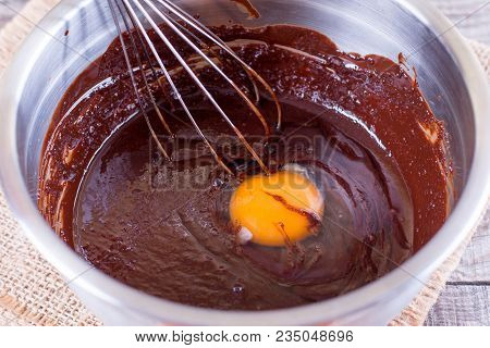 Mixed Yolk Eggs And Chocolate For Baking Cake Or Bake. Chocolate Cake Or Brownie
