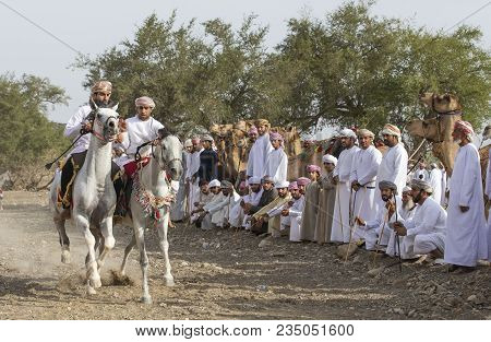 Omani Men On A Horse In  Rural Oman, Racing For Fun