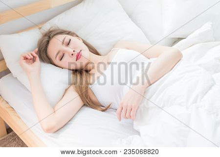 Woman Sleep On The Bed At Home In Morning