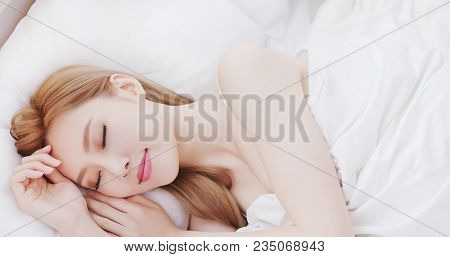 Woman Sleep On The Bed At Home In Morning