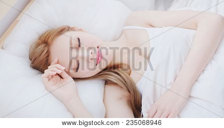 Woman Sleep On The Bed At Home In Morning