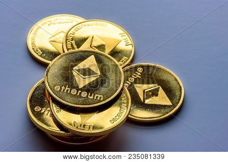 Golden Bitcoin Coins On A Dark Background With Euro Coins. Virtual Currency. Crypto Currency. New Vi