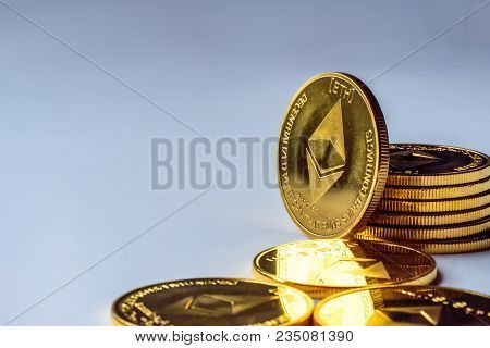 Golden Bitcoin Coins On A Dark Background With Euro Coins. Virtual Currency. Crypto Currency. New Vi