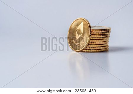 Golden Bitcoin Coins On A Dark Background With Euro Coins. Virtual Currency. Crypto Currency. New Vi