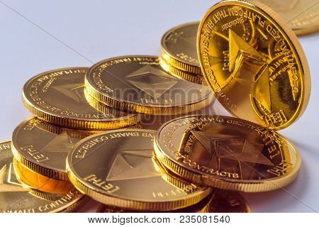 Golden Bitcoin Coins On A Dark Background With Euro Coins. Virtual Currency. Crypto Currency. New Vi