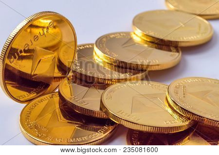 Golden Bitcoin Coins On A Dark Background With Euro Coins. Virtual Currency. Crypto Currency. New Vi