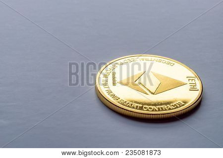 Golden Virtual Money Ethereum Crypto Currency Coin On A Dark Background.