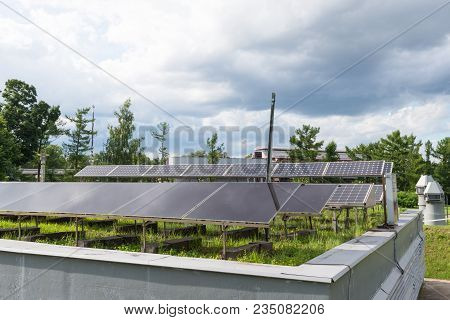 Solar Battery Background Of The Cloudy Sky