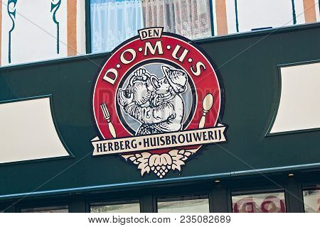 Leuven, Belgium - September 05, 2014: Signboard Of The Domus Restaurant And Brewery On The Eikstraat