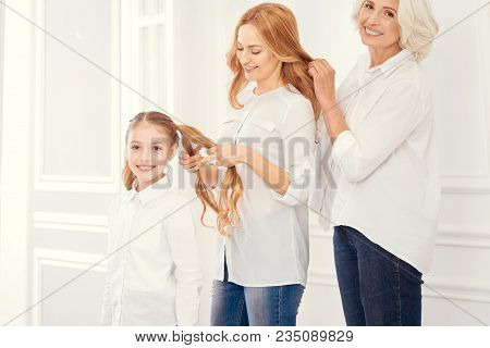 Happy Women Are The Prettiest. Precious Moment Of Loving Ladies Standing Behind Each Other While Com