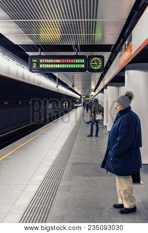 Vienna, Austria - December 2, 2017: People Waiting For A Train At A Metro Station In The Landstrasse